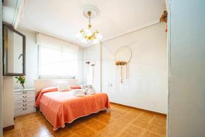 Katil atau katil-katil dalam bilik di La Huertina De Granda