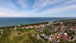 an aerial view of a town next to the ocean at Wellenwiese 29 in Zingst