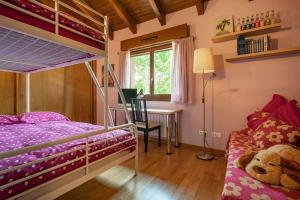 Krevet ili kreveti na kat u jedinici u objektu Casa rural edambe pereda