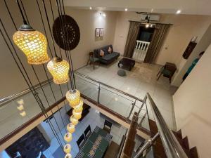 an overhead view of a living room with lights at 3 Bedroom villa with Private Pool in North Goa in Assagao