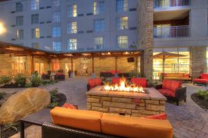 a patio with a fire pit in front of a building at Courtyard by Marriott Gatlinburg Downtown in Gatlinburg