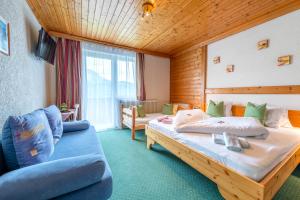 Postel nebo postele na pokoji v ubytování Panoramahotel Stocker