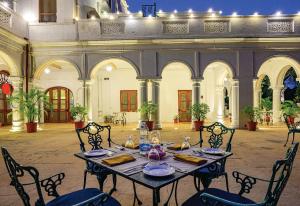 A restaurant or other place to eat at Neemrana's - Baradari Palace