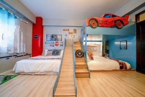 Uma cama ou camas num quarto em Yilan 1955 B&B Second Branch