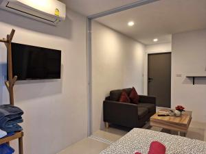 TV a/nebo společenská místnost v ubytování Mantra condo by malai