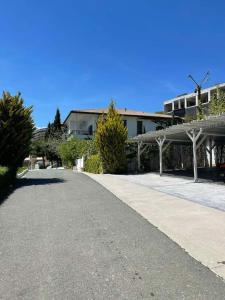 a building with a pathway in front of a building at k.k Elenite Vila Astoria 5 in Sveti Vlas