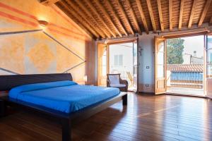 Ένα ή περισσότερα κρεβάτια σε δωμάτιο στο Borgo Patresi Mare DL