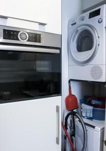 Kuchyň nebo kuchyňský kout v ubytování BMP APARTMENT ATMOSPHERE 1 CENTRALE con GARAGE