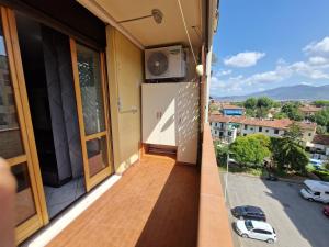 an apartment balcony with a view of a street at Miriam House Florence - full apartment - relax & comfort in Florence