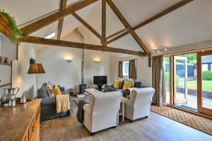 a living room with a couch and chairs at Finest Retreats - The Burrow at Conygre Farm in Pewsey