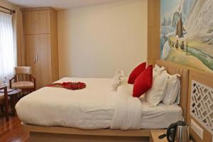 Letto o letti in una camera di Hotel Malati