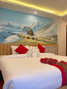 Letto o letti in una camera di Hotel Malati