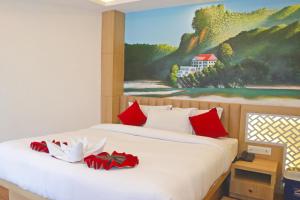 Letto o letti in una camera di Hotel Malati