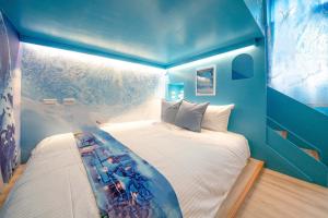 Uma cama ou camas num quarto em Yilan 1955 B&B Second Branch
