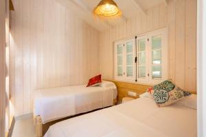 Dunas Luxury Beach Resort Tarifa客房内的一张或多张床位