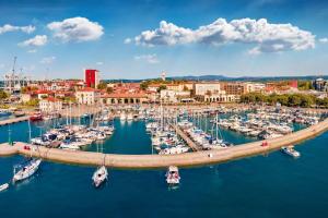 an aerial view of a harbor with boats in the water at ZARA APARTMENTS in Koper