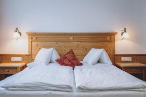 Postel nebo postele na pokoji v ubytování Hotel Vorderronach