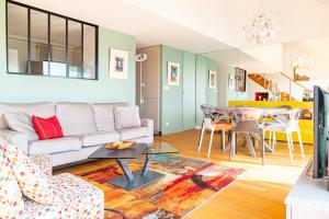 Posezení v ubytování Au Fil de L'Erdre - Spacieux appt avec terrasse + 5 fotografií