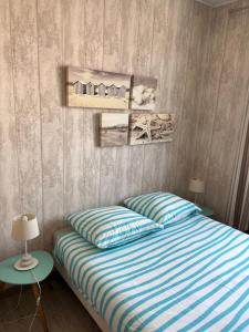 Postel nebo postele na pokoji v ubytování Appartement st palais sur mer