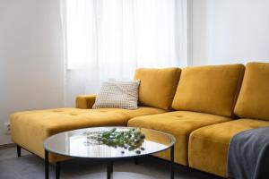 Posezení v ubytování Enjoy Downtown Boutique Apartments #13 by Goodnite cz
