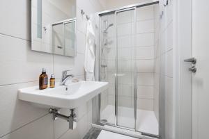 Koupelna v ubytování Enjoy Downtown Boutique Apartments #13 by Goodnite cz