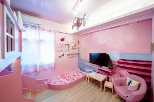 Uma televisão e/ou sistema de entretenimento em Yilan 1955 B&B Second Branch