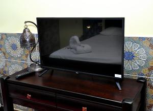 سرير أو أسرّة في غرفة في New Star Zamalek Hotel