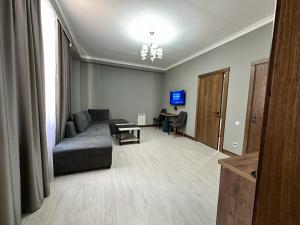 TV in/ali zabaviščno središče v nastanitvi Lumarc Hotel