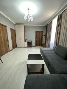 Predel za sedenje v nastanitvi Lumarc Hotel