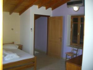 Postel nebo postele na pokoji v ubytování Blue Villa