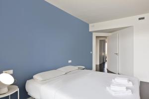 Posteľ alebo postele v izbe v ubytovaní Port Forum Apartments by Olala Homes
