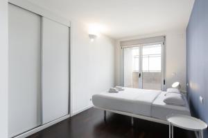 Posteľ alebo postele v izbe v ubytovaní Port Forum Apartments by Olala Homes