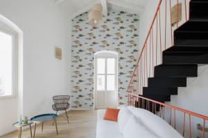 Galería fotográfica de AltaMarea - Luce, spazi ampi e comfort al centro del paese en Carloforte 31 fotos más