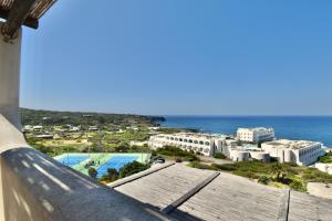 a view of the ocean from a building at Kuddie Rosse Eco-Friendly Residence in Pantelleria