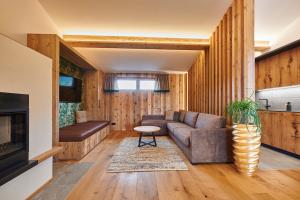 Posezení v ubytování Penthouse Suite by Brugger