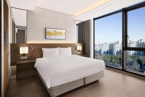 Postelja oz. postelje v sobi nastanitve Four Points by Sheraton Suwon