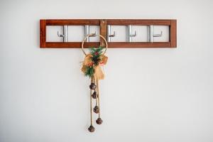 a christmas cross hanging on a wall at GuestReady - Penthouse Flat in Trendy Peckham in London