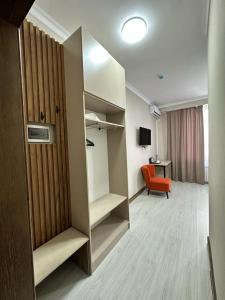 Predel za sedenje v nastanitvi Lumarc Hotel