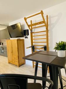 Kuchyň nebo kuchyňský kout v ubytování MEINpartments Wolfsburg + 12 fotografií