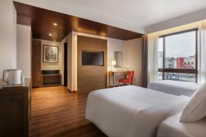Dusit Princess Kathmandu客房内的一张或多张床位