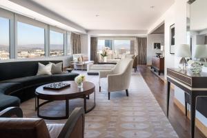 a living room with a couch and a table at The Ritz-Carlton, Los Angeles L.A. Live in Los Angeles