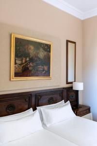 Postel nebo postele na pokoji v ubytování Parador de Lerma