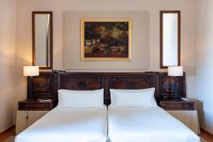 Postel nebo postele na pokoji v ubytování Parador de Lerma