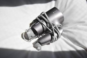 a black and white photo of a microphone at 東駒形302 in Tokyo