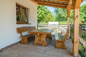 En balkon eller terrasse på Litoral Domki Lubkowo