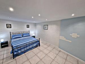Postel nebo postele na pokoji v ubytování Manfredi Home