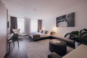 Postel nebo postele na pokoji v ubytování Guesthouse Suiteseven