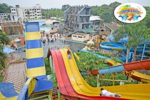 a water park with a bunch of water slides at Villa Betty Individual 2 Rooms property at beach front Near French colony in Pondicherry