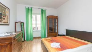 A bed or beds in a room at Rental in Rome Santini apartment