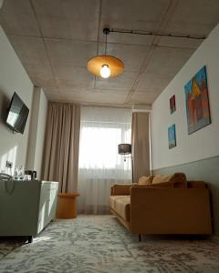 TV a/nebo společenská místnost v ubytování Arche Hotel Wrocław Airport